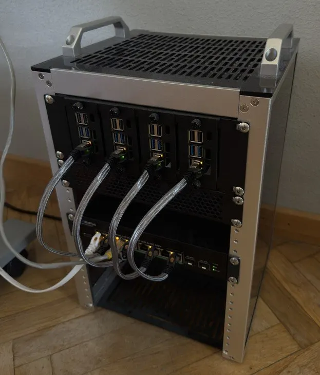 Four Raspberry Pi 5 cluster runs Qwen3-30B-A3B on CPU at 15 tokens/s
