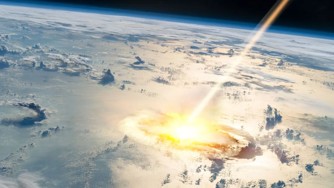 Oklahoma's Ames crater is 100 million years younger and coincided with a mass extinction