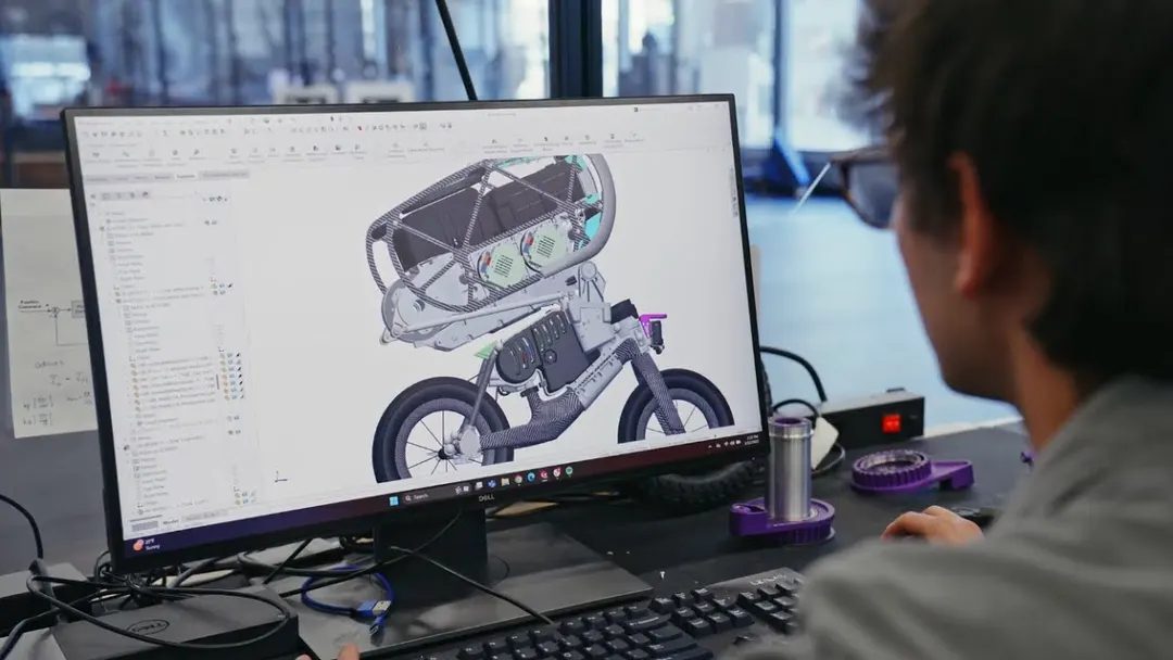 Bicycle-inspired UMV robot performs wheelies, jumps and front flips at speed