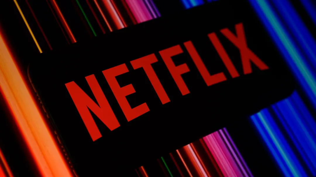 Netflix Q3 revenue rises 12% to $12.87B, net income up 44%; stock falls 4%