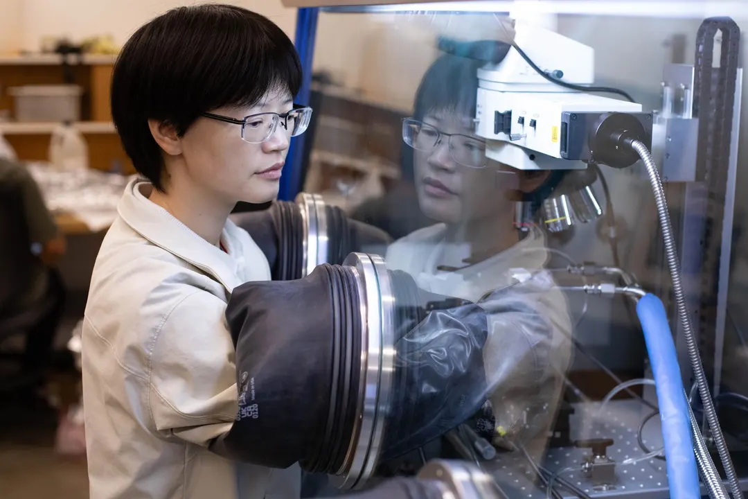 Uranium Oxytelluride Hides Chiral Superlattice With Dual Magnetism
